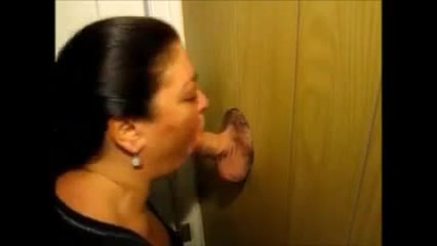 Latina grandma sucking at the glory hole and drink cum