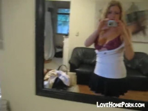 Tracy gets naked in front of mirror