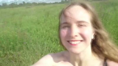 Nude walk through the grass, naked girl in the countryside