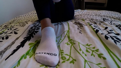 Neighbors wife gives me a socksjob, a handjob in beautiful white socks, I cum on her little feet