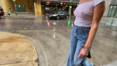 Girls top gets wet in rain exposing tits in public