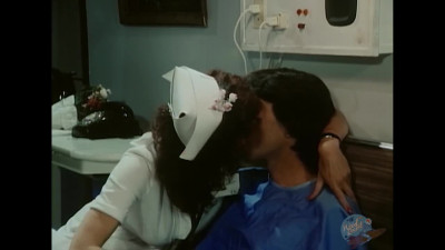 Busty Nurse Kay Parker screws young patient