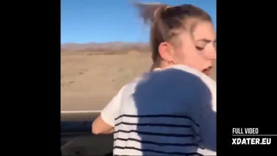 Pretty blonde girl fucked from behind while driving a car