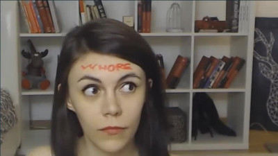 MoniqueRozen writes sexy words on her body