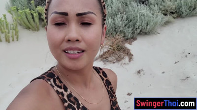 Huge tits Thai MILF public masturbation on a beach in Thailand