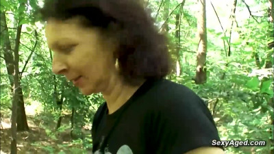 Hairy pussy amateur granny Franca fucks in the woods with voyeur stranger