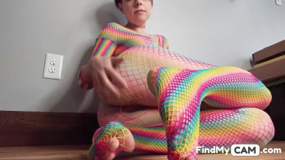 Teen in Rainbow Fishnets Fingers Herself