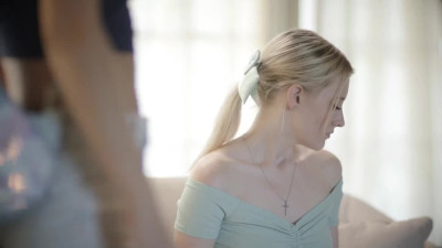 Melody Marks and Kenna James on a white coloured sofa in several lesbian scenes
