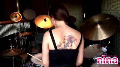 Lesbian nina gets naked to play the drums