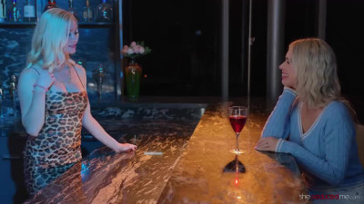 Serene S and Jill K inside a bar room in several different lesbian scenes together