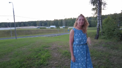 A couple, in plain sight, engaged in extreme sex in a clearing near the road