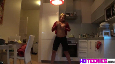 Sonya showing her big tits and pussy in Kitchen